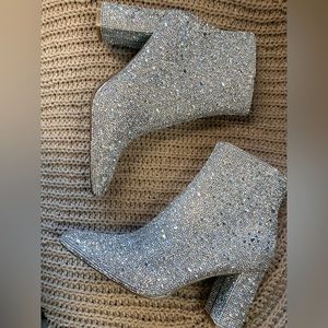 size 6.5 Betsy Johnson silver rhinestone booties. Never worn only tried on.